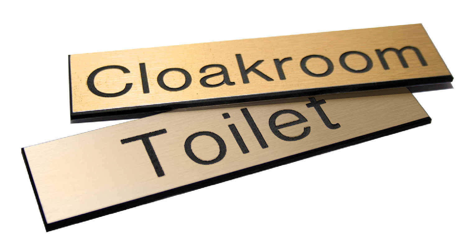 Engraved Sign With Adhesive Backing - 140x35mm Dia Black Text On Brass Effect